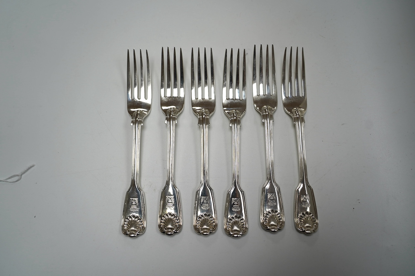 A set of six early Victorian silver fiddle, thread and shell pattern dessert forks, by Mary Chawner, London, 1838, 17.3cm, 12oz. Condition - poor to fair